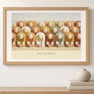 Shelf mockup of Manna in the Wilderness in a light oak frame resting on a pale wood surface beside stacked neutral books and a rounded ceramic vase. The framed print shows faceless figures bending to gather pale manna across a warm cream ground. Cream matting, soft wall texture, and natural light present the horizontal Bible artwork at an easy domestic scale.