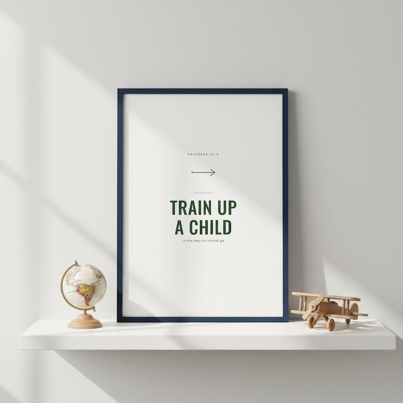 Train Up a Child Proverbs 22:6 Wall Art Christian Boys Room Print Scripture Deco — lifestyle mockup in modern room setting with elegant framed print on wall. This elegant christian scripture wall art print features beautiful serif typography on warm cream background. Proverbs 22:6 bible verse digital download printable for home office bedroom living room gallery wall decor. Perfect christian gi...
