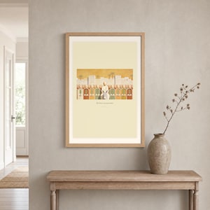 Room mockup of The Entry into Jerusalem displayed in a light oak frame on a warm neutral wall. The landscape artwork shows the entry into Jerusalem, with a crowd of faceless figures raising flat palm fronds along the city wall. A wide cream mat and restrained fresco palette suit a calm living room, prayer space, or Christian home. The printed title and Matthew 21:9 remain visible beneath the image.
