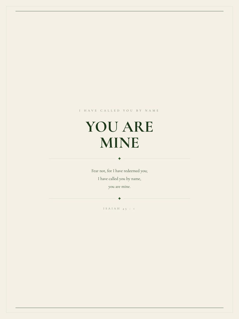 Hero view of the framed design, clearly showing the verse lettering, balanced spacing, and refined color palette. The You Are Mine artwork features Isaiah 43:1 in minimalist forest green typography on warm beige. This Isaiah 43:1 print suits a nursery, baptism gift, baby dedication, bedroom, or calm Christian reading corner as printable digital wall art.