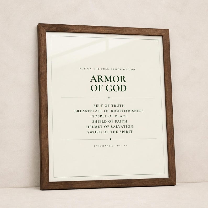 Armor of God Ephesians 6 scripture print bold minimalist christian wall art boys room confirmation baptism gift dark forest green typography on warm cream background, hero product shot walnut frame leaning against wall natural light glass reflection, digital download printable wall art instant download