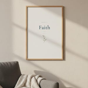 Faith Hebrews 11:1 Wall Art Blue Navy Coquette Christian Print Scripture Decor D — botanical glass frame mockup with natural light and greenery. This coquette bow, navy blue christian scripture wall art print features beautiful serif typography on warm cream background. Hebrews 11:1 bible verse digital download printable for home office bedroom living room gallery wall decor. Perfect christian ...