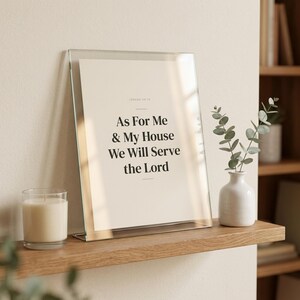 Fathers Day Christian Wall Art Set of 3 Bible Verse Prints Scripture Dad Gift, in warm masculine scripture typography with classic serif design, perfect Father's Day gift for Christian dads, displayed in a bright modern entryway next to a coat rack with natural greenery, serving as welcoming faith-filled home decor