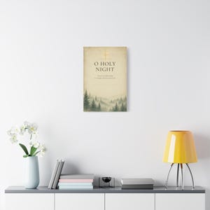 A misty evergreen forest fades beneath refined O Holy Night serif lettering on softly aged cream vintage paper, crowned by a golden Star of Bethlehem. This elegant warm neutral design draws on the Christmas carol composed by Adolphe Adam in 1847 and Luke 2:11. The artwork is printed on stretched canvas. This close product view highlights the printed surface and finished edges.