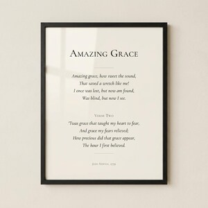 Custom Christian Hymn Art in clean black frame on warm cream wall - hero product photo of Amazing Grace. Custom Christian Hymn Art Print, personalized hymn lyrics wall art, modern Christian wall art digital download, scripture print, pastor appreciation gift, Bible verse art, customized Christian artwork, printable hymn poster
