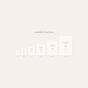 For This Child I Have Prayed 1 Samuel 1 27 Nursery Wall Art Bible Verse Print, in gentle sage green nursery design with soft botanical watercolor illustration, calming earth tones and tender serif typography, showcased in a gallery wall arrangement above a nursing chair with coordinating prints, creating a peaceful and meaningful space for feeding and bonding with baby
