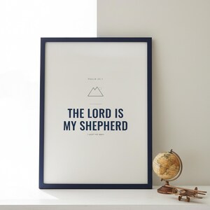 The Lord Is My Shepherd Psalm 23:1 Wall Art Christian Boys Room Print Scripture  — lifestyle mockup in modern room setting with elegant framed print on wall. This elegant christian scripture wall art print features beautiful serif typography on warm cream background. Psalm 23:1 bible verse digital download printable for home office bedroom living room gallery wall decor. Perfect christian gift ...