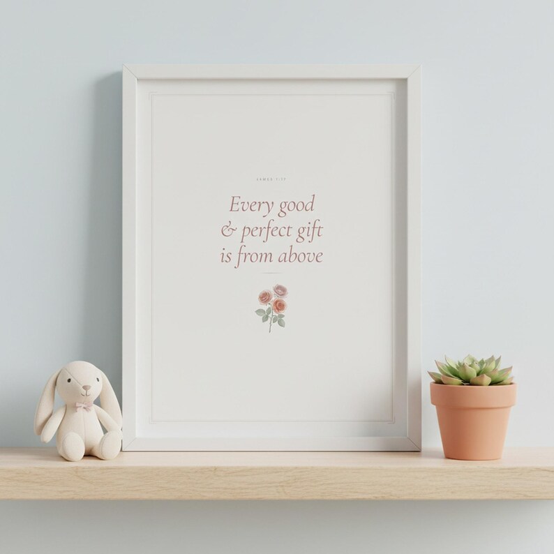 Every Good and Perfect Gift James 1 17 Wall Art Coquette Christian Print Blush B — lifestyle mockup in modern room setting with elegant framed print on wall. This coquette bow, botanical, pink blush christian scripture wall art print features beautiful serif typography on warm cream background. James 1 17 bible verse digital download printable for home office bedroom living room gallery wall de...