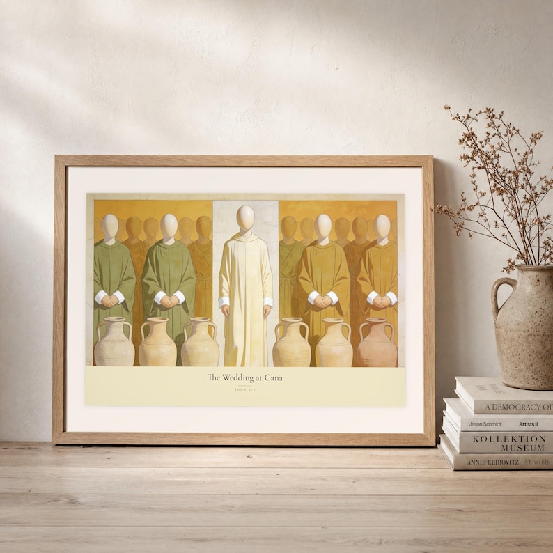 Leaning frame mockup of The Wedding at Cana on a rustic wood console beside stacked art books and a tall ceramic vessel with dried stems. The print shows Christ centered between six complete stone jars, with three on the left and three on the right. The oak frame, broad cream mat, plaster wall, and soft side light create a relaxed display while keeping the title and John 2:7 legible.