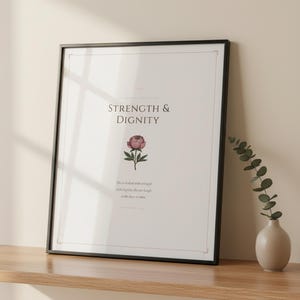 Proverbs 31 25 Mothers Day Print She Is Clothed Strength Dignity Christian Wall, in gentle sage green nursery design with soft botanical watercolor illustration and calming earth tones, styled on a wooden floating shelf next to a ceramic vase with dried eucalyptus, creating a warm and inviting Christian home decor vignette