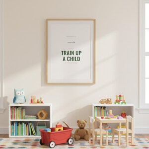 Train Up a Child Proverbs 22:6 Wall Art Christian Boys Room Print Scripture Deco — close-up detail of typography and paper texture. This elegant christian scripture wall art print features beautiful serif typography on warm cream background. Proverbs 22:6 bible verse digital download printable for home office bedroom living room gallery wall decor. Perfect christian gift idea from TheFramedVers...