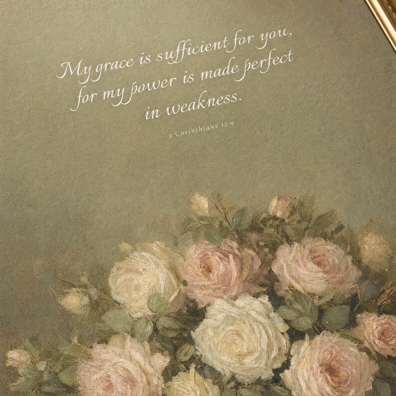Extreme close-up macro photograph of My Grace Is Sufficient 2 Corinthians 12:9 vintage oil painting print on premium archival matte paper, showing canvas brushstroke texture, ink saturation, crystal-clear Italianno cursive verse typography, antique floral painting detail in tack-sharp focus, TheFramedVerse Christian digital download