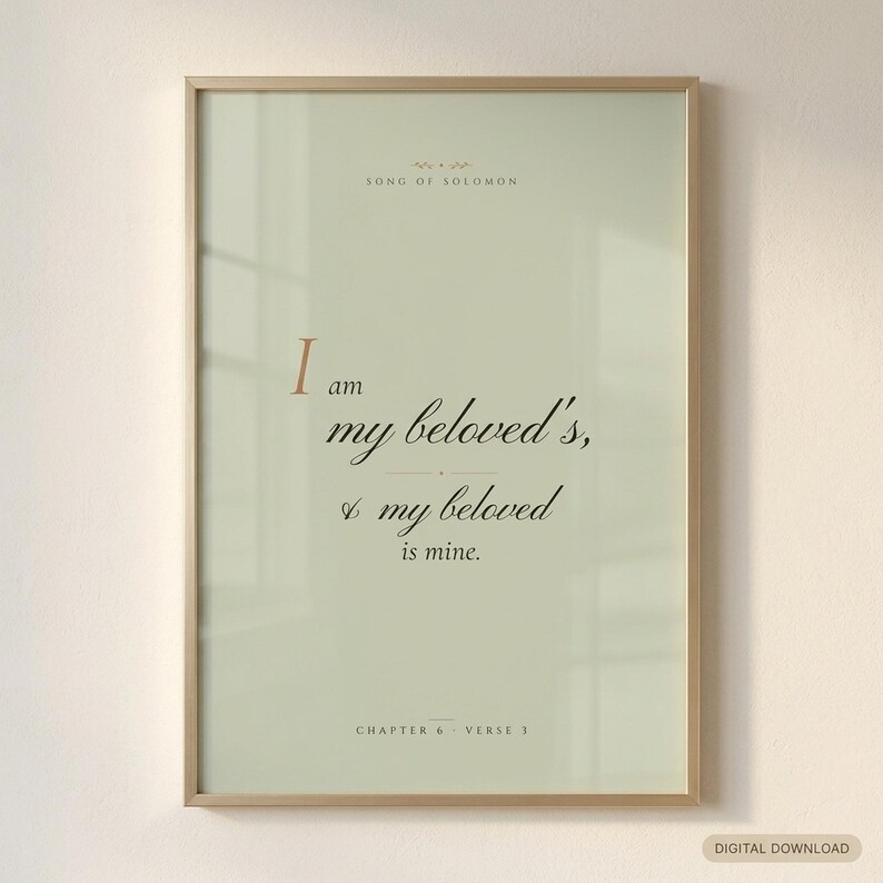 Song of Solomon 6:3 'I Am My Beloved's, and My Beloved Is Mine' coquette sage Christian wedding scripture print in solid walnut frame, frontal studio shot on cream backdrop with soft top-left key light, glass reflection, e-commerce hero photograph, bridal shower gift digital download by TheFramedVerse
