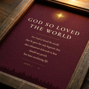 John 3:16 close-up detail - God So Loved the World italic cream verse, gold star, dark burgundy christmas scripture print typography