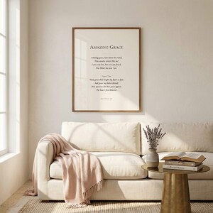 Custom Christian Hymn Art hung in modern Christian living room above cream sofa - lifestyle home decor mockup. Custom Christian Hymn Art Print, personalized hymn lyrics wall art, modern Christian wall art digital download, scripture print, pastor appreciation gift, Bible verse art, customized Christian artwork, printable hymn poster