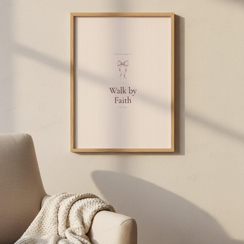 Walk by Faith Not by Sight 2 Corinthians 5:7 Wall Art Pink Blush Coquette Christ — botanical glass frame mockup with natural light and greenery. This coquette bow, pink blush christian scripture wall art print features beautiful serif typography on warm cream background. Sight 2 bible verse digital download printable for home office bedroom living room gallery wall decor. Perfect christian gift...