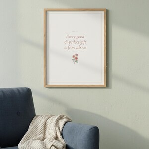 Every Good and Perfect Gift James 1 17 Wall Art Coquette Christian Print Blush B — front facing framed mockup on clean white wall with shadow. This coquette bow, botanical, pink blush christian scripture wall art print features beautiful serif typography on warm cream background. James 1 17 bible verse digital download printable for home office bedroom living room gallery wall decor. Perfect ch...