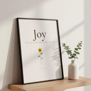 Fruit of the Spirit Joy Bible Verse Wall Art on oak shelf with eucalyptus, Galatians 5:22 sunflower botanical illustration aesthetic christian floral scripture, Joy of the Lord is your strength set of 9 christian decor