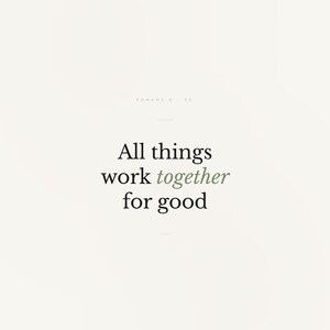 Romans 8:28 Wall Art All Things Work Together for Good Minimalist Scripture Prin — hero framed product shot with glass reflection and premium frame. This modern minimalist christian scripture wall art print features beautiful serif typography on warm cream background. Romans 8:28 bible verse digital download printable for home office bedroom living room gallery wall decor. Perfect christian gif...