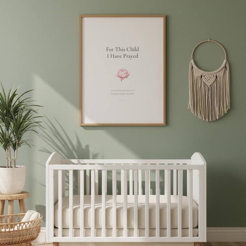1 Samuel 1 27 For This Child I Have Prayed nursery wall art in oak frame on sage green wall above white crib with macrame and rattan decor. Watercolor pink peony botanical illustration. Gender neutral Christian nursery printable digital download for baptism baby shower christening gift.