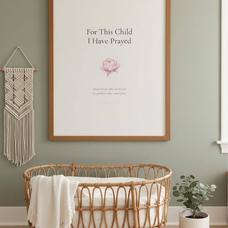 For This Child I Have Prayed 1 Samuel 1 27 Nursery Wall Art Bible Verse Print, — "For this child I have prayed, and the Lord has granted me what I asked of Him", in gentle sage green nursery design with soft botanical watercolor illustration, calming earth tones and tender serif typography, showcased in an elegantly designed nursery with warm wood baby furniture and soft botanical touches