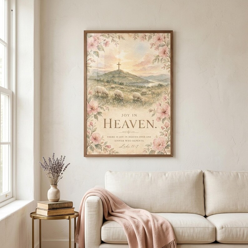 Joy in Heaven Luke 15:7 watercolor cross wall art print displayed in walnut wood frame above a cream linen sofa in a sunlit Christian family living room with dried lavender, brass side table, and blush throw blanket. Wooden cross on hilltop at dawn — pastor appreciation gift, christian wall art, faith home decor. Digital download instant access.