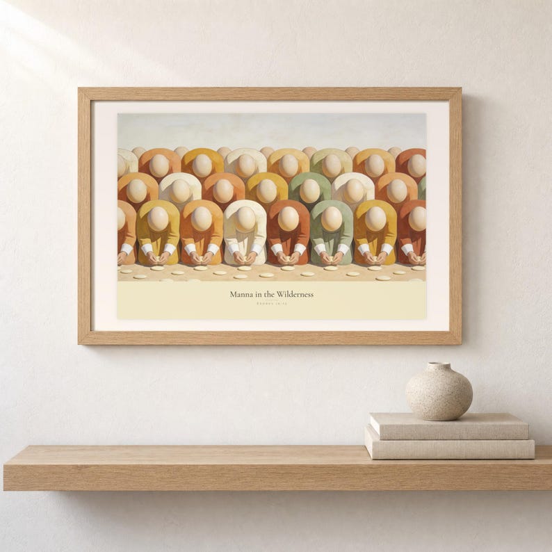 Shelf mockup of Manna in the Wilderness in a light oak frame resting on a pale wood surface beside stacked neutral books and a rounded ceramic vase. The framed print shows faceless figures bending to gather pale manna across a warm cream ground. Cream matting, soft wall texture, and natural light present the horizontal Bible artwork at an easy domestic scale.