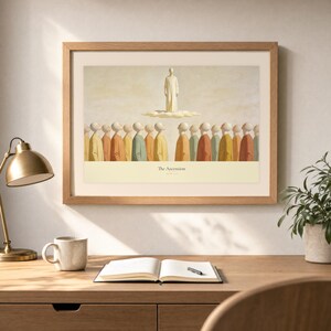 Desk mockup of The Ascension in a light oak frame above a wooden workspace with a brass lamp, ceramic mug, open notebook, pen, and leafy plant. The artwork shows Christ standing in light above a soft cloud while gathered witnesses look upward. Angled sunlight, neutral styling, and cream matting place the Bible story print in a quiet study or home office setting.