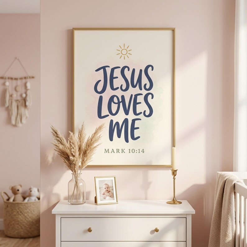 Jesus Loves Me Mark 10:14 bible verse print styled in pastel pink girls nursery with white dresser, dried pampas grass, and brass candle. Modern hand-lettered script with gold accents — part of Kids Christian wall art set of 6. Perfect girls room decor, baby girl baptism gift, baby shower gift, christian nursery.