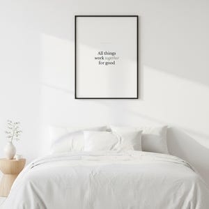Romans 8:28 Wall Art All Things Work Together for Good Minimalist Scripture Prin — close-up detail of typography and paper texture. This modern minimalist christian scripture wall art print features beautiful serif typography on warm cream background. Romans 8:28 bible verse digital download printable for home office bedroom living room gallery wall decor. Perfect christian gift idea from TheFr...