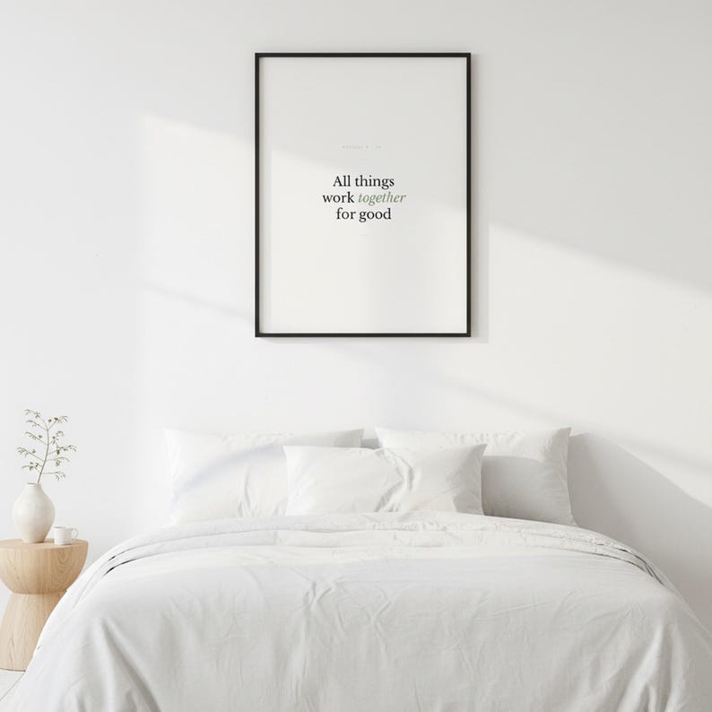 Romans 8:28 Wall Art All Things Work Together for Good Minimalist Scripture Prin — close-up detail of typography and paper texture. This modern minimalist christian scripture wall art print features beautiful serif typography on warm cream background. Romans 8:28 bible verse digital download printable for home office bedroom living room gallery wall decor. Perfect christian gift idea from TheFr...