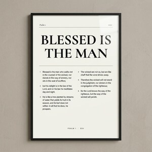 Psalm 1 'Blessed Is The Man' Bible verse wall art framed frontal in a slim black metal frame on a cream limewashed plaster wall. Modern Christian editorial typography poster, ideal Father's Day gift for godly men, instant digital download from TheFramedVerse on Etsy.