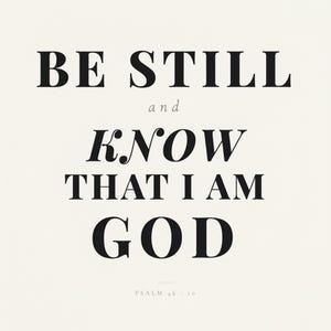 Psalm 46 10 Wall Art Be Still and Know That I Am God Scripture Print Christian, in contemporary bold serif typography in black on clean white background, hanging above a cozy bed in a peaceful bedroom setting, creating an inspiring and calming atmosphere for morning devotions and evening prayer