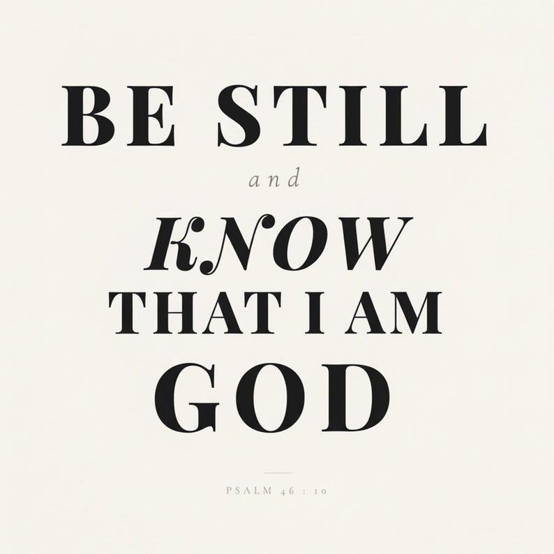 Psalm 46 10 Wall Art Be Still and Know That I Am God Scripture Print Christian, in contemporary bold serif typography in black on clean white background, hanging above a cozy bed in a peaceful bedroom setting, creating an inspiring and calming atmosphere for morning devotions and evening prayer
