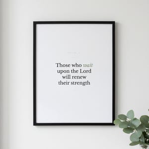 Isaiah 40:31 Wall Art Those Who Wait Upon the Lord Minimalist Scripture Print Bi — lifestyle mockup in modern room setting with elegant framed print on wall. This modern minimalist christian scripture wall art print features beautiful serif typography on warm cream background. Isaiah 40:31 bible verse digital download printable for home office bedroom living room gallery wall decor. Perfect chr...
