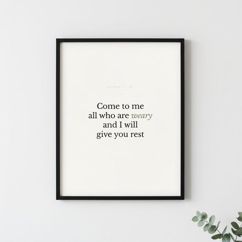 Matthew 11:28 Wall Art Come to Me All Who Are Weary Minimalist Scripture Print B — lifestyle mockup in modern room setting with elegant framed print on wall. This modern minimalist christian scripture wall art print features beautiful serif typography on warm cream background. Matthew 11:28 bible verse digital download printable for home office bedroom living room gallery wall decor. Perfect ch...