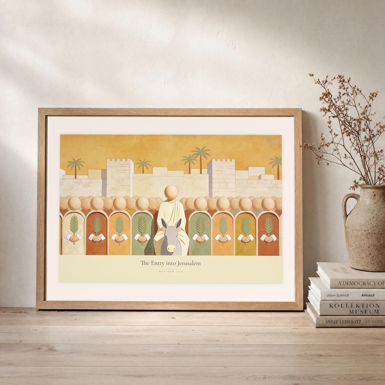 Leaning frame mockup of The Entry into Jerusalem on a rustic wood console beside stacked art books and a tall ceramic vessel with dried stems. The print shows the entry into Jerusalem, with a crowd of faceless figures raising flat palm fronds along the city wall. The oak frame, broad cream mat, plaster wall, and soft side light create a relaxed display while keeping the title and Matthew 21:9 legible.