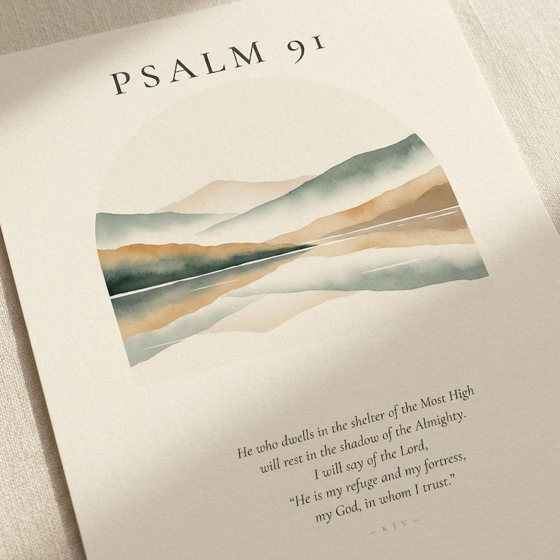 Extreme close-up macro photograph of custom scripture watercolor print on premium archival matte paper, showing crisp Cormorant Garamond serif typography, paper texture, ink saturation, and fine watercolor detail in the arched mountain-lake design, slight 6-degree angle, no props, clean editorial product shot for Christian wall art digital download