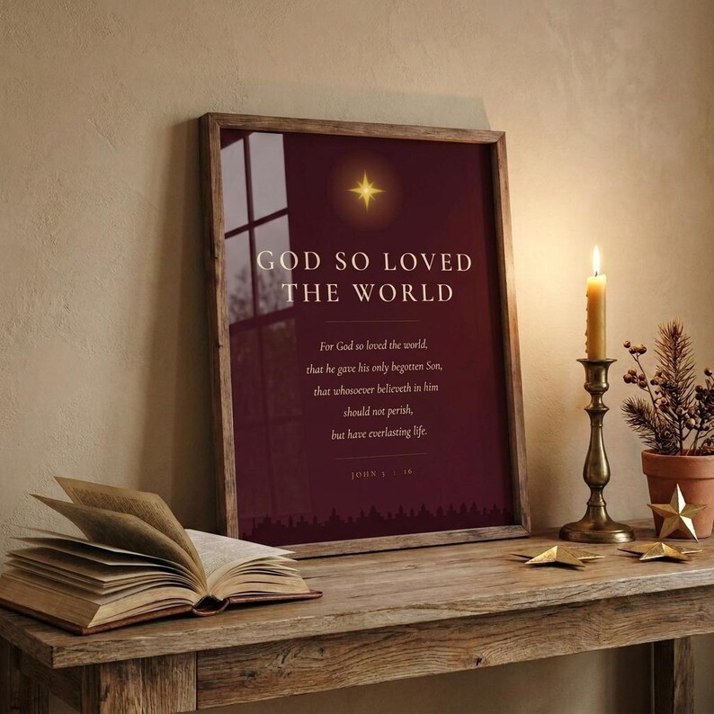 John 3:16 God So Loved on shelf, walnut frame, cozy christmas vignette with candle and pine, burgundy gold scripture print decor