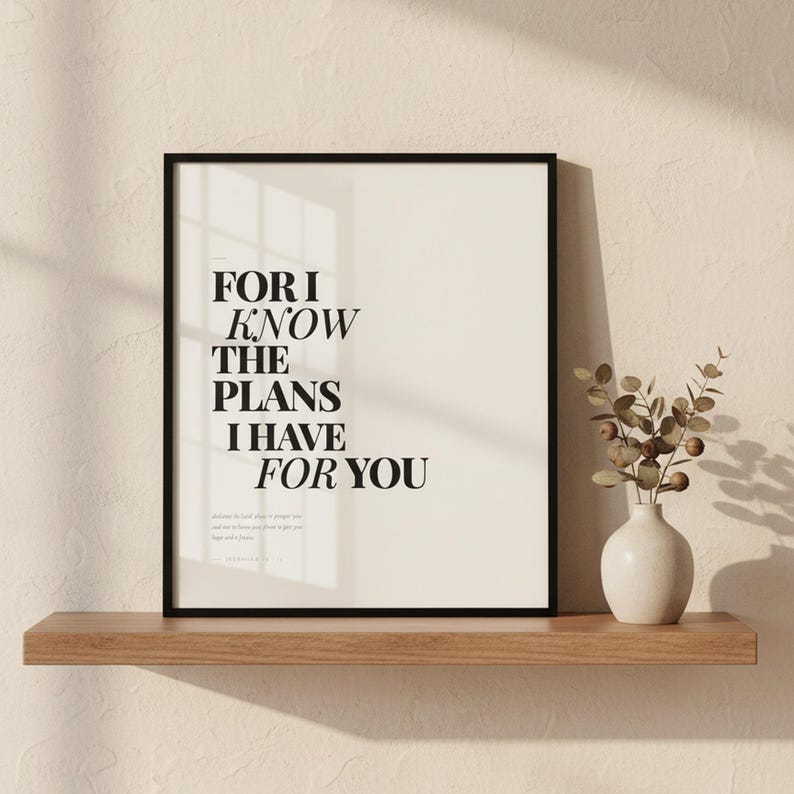 Jeremiah 29:11 Wall Art For I Know the Plans I Have for You Modern Christian, — "For I know the plans I have for you, declares the Lord, plans to prosper you", in contemporary bold serif typography in black on clean white background, showcased in an elegant contemporary home interior with curated decor elements, demonstrating how this Christian art piece elevates any living space