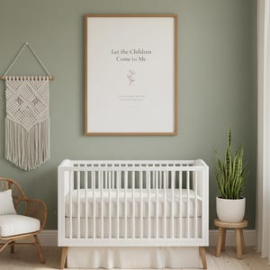 Matthew 19 14 Let the Children Come to Me nursery wall art in oak frame on sage green wall above white crib with macrame and rattan decor. Watercolor cotton flower botanical illustration. Gender neutral Christian nursery printable digital download for baptism baby shower christening gift.