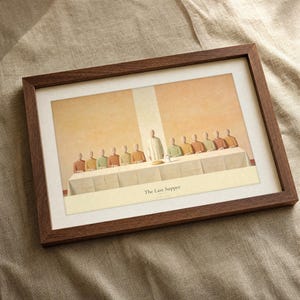 Extreme macro detail of the Last Supper art print on archival matte paper, showing the fresco like plaster texture of the background, the flat terracotta and olive robes of the seated figures and the crisp small caps LUKE 22:19 reference line in tack sharp focus. Visible paper grain and deep ink saturation, modern Christian wall art digital download from TheFramedVerse on Etsy.
