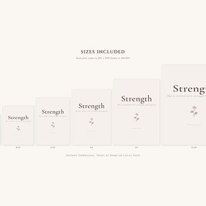 Proverbs 31 25 Wall Art She is Clothed in Strength and Dignity Scripture Print, in elegant Mother's Day design with soft pink watercolor botanical flowers and graceful serif typography, hanging above a cozy bed in a peaceful bedroom setting, creating an inspiring and calming atmosphere for morning devotions and evening prayer