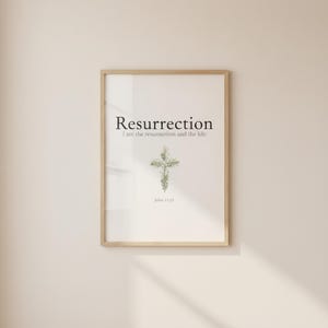 Christian Floral Cross Easter Art, Scripture Wall Decor, in beautiful floral cross composed of spring roses, greenery and wildflowers, photographed in beautiful close-up detail showing the premium glass frame reflection, the crisp typography and the intricate artistic details of the design