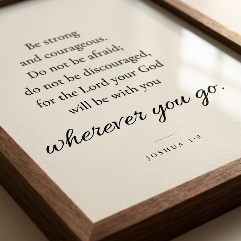 Close-up macro detail of Joshua 1:9 'wherever you go' in elegant Allura cursive script on premium fine-art matte paper, warm walnut frame edge visible. Modern minimalist Christian typography wall art, instant digital download, Father's Day gift for Christian dads, grandfathers, confirmation and baptism gift for boys.
