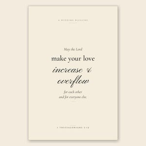 Extreme close-up macro of the 1 Thessalonians 3:12 'May the Lord Make Your Love Increase' Christian wedding wall art print on premium archival matte paper, showing the elegant Cormorant body and Pinyon Script climax typography in crystal-clear detail, paper texture visible. TheFramedVerse digital download for couple scripture wall art.