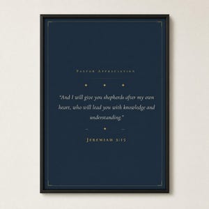 Jeremiah 3:15 Shepherds After My Own Heart scripture print in thin black metal frame, frontal view on off-white textured wall, modern minimalist styling, soft top light with gentle shadow below frame, e-commerce hero photograph, christian pastor gift digital download, pastor office decor from TheFramedVerse on Etsy