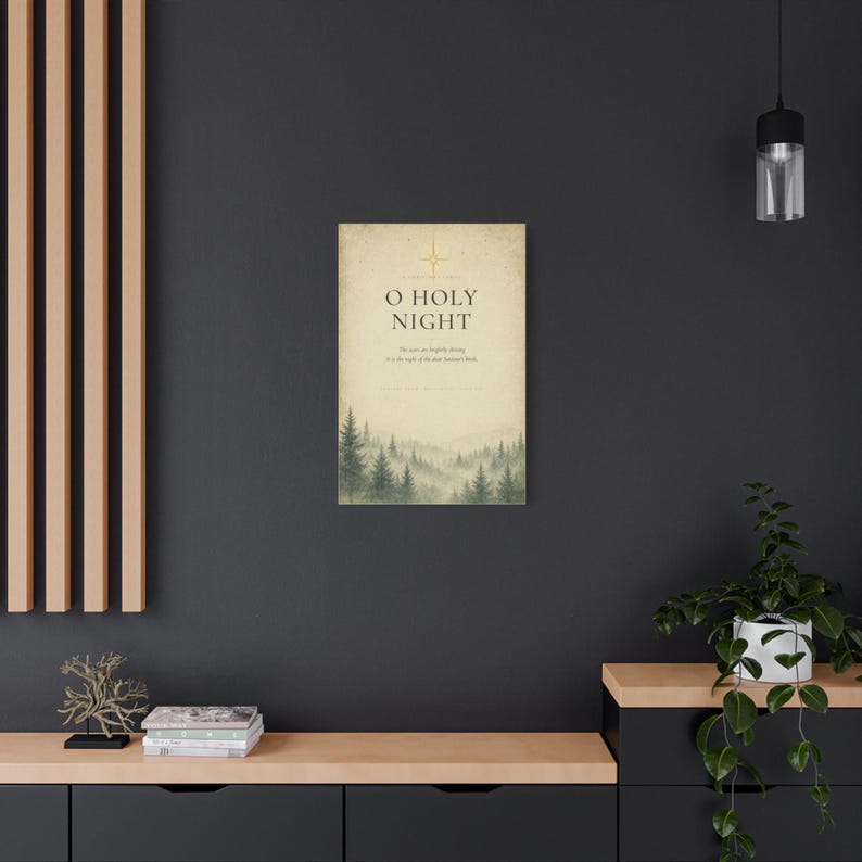A golden Star of Bethlehem shines above refined O Holy Night serif lettering, while misty evergreens fade across softly aged cream vintage paper. Inspired by Adolphe Adam's 1847 Christmas carol and Luke 2:11, the elegant warm neutral typography artwork is printed on stretched canvas. This angled product view shows the gallery wrapped edge clearly.