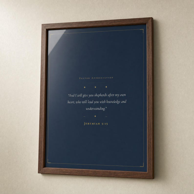 Jeremiah 3:15 Shepherds After My Own Heart scripture print in solid walnut frame, frontal studio shot on warm cream backdrop with soft top-left key light, glass reflection visible, hero photograph, christian pastor gift digital download, pastor appreciation wall art by TheFramedVerse, pastoral gifts modern minimalist