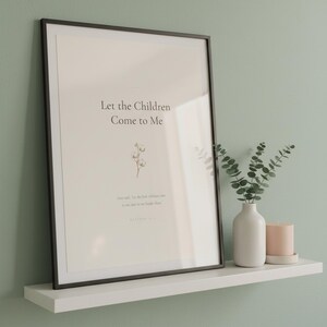 Matthew 19 14 Let the Children Come to Me scripture print in black frame with glass on white shelf against sage green wall. Eucalyptus vase and pink candle. Watercolor cotton flower illustration. Christian nursery Bible verse printable digital download.